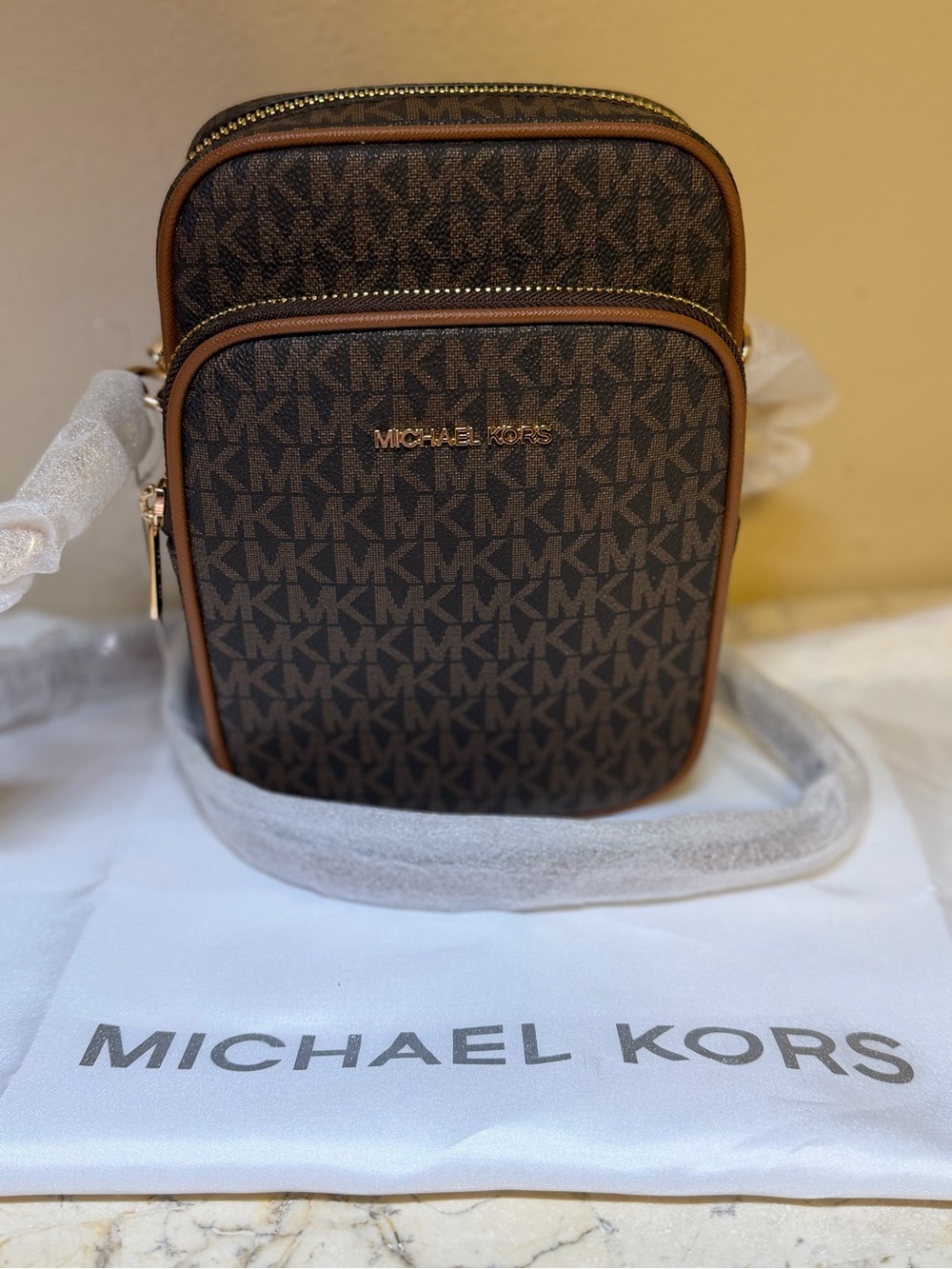 NWT- Michael Kors Brown Monogram Crossbody with dust bag